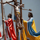 Religious procession depicting crucifixion scene with Roman soldiers under blue sky