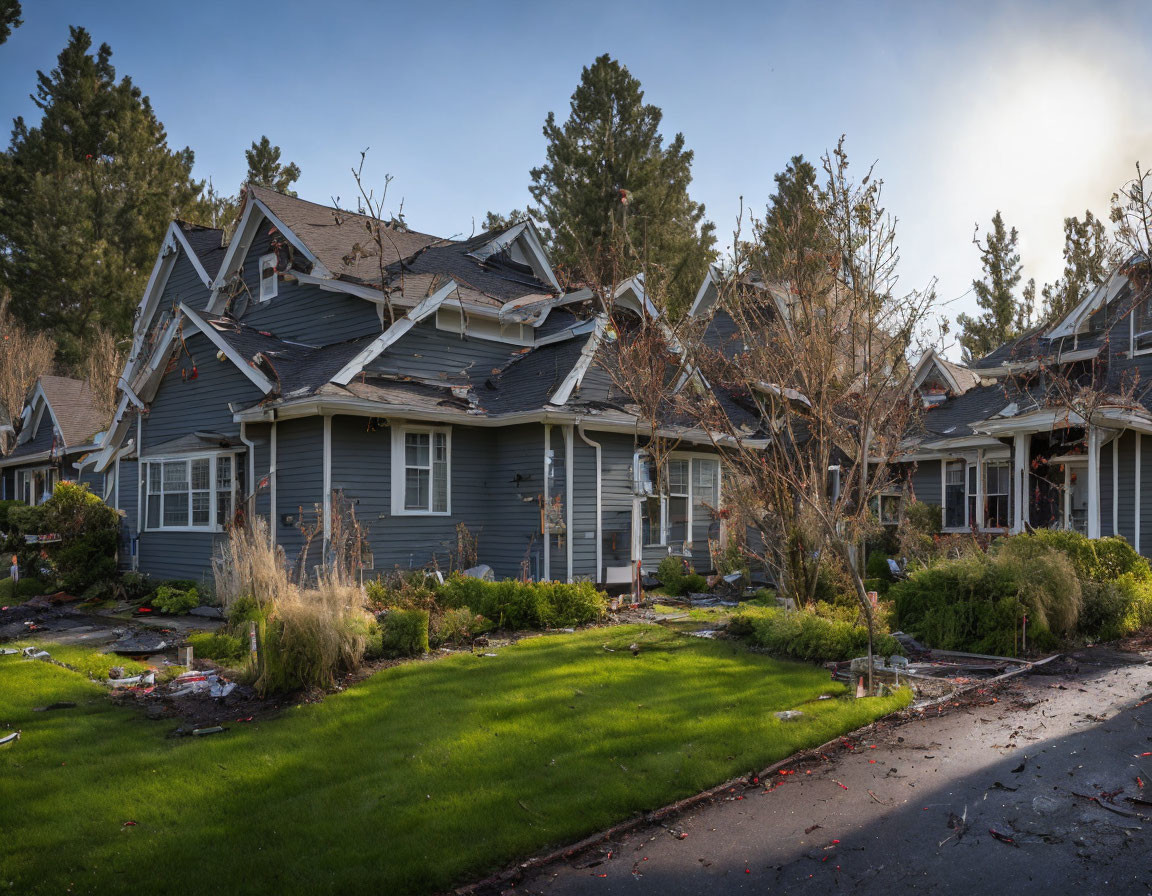 Row of Two-Story Gray Houses with Front Porches