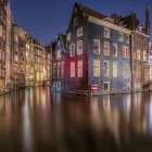 Picturesque Canal with Colorful Houses and Stone Bridges at Twilight
