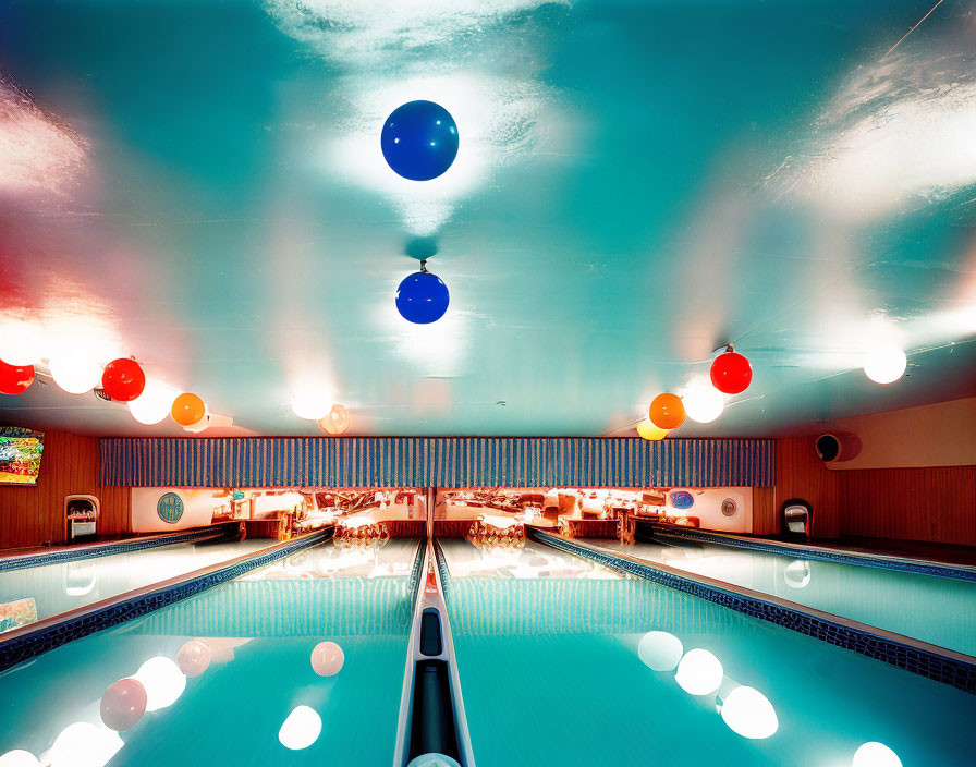 Vibrant retro bowling alley with blue lanes and cosmic ceiling ambiance