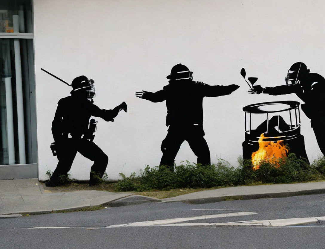 Street art of three figures in riot gear with central figure throwing flowers