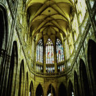 Medieval-style Hall with High Ceilings and Golden Carvings