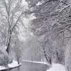 Snowy park scene: Two people walking in winter under purple sky