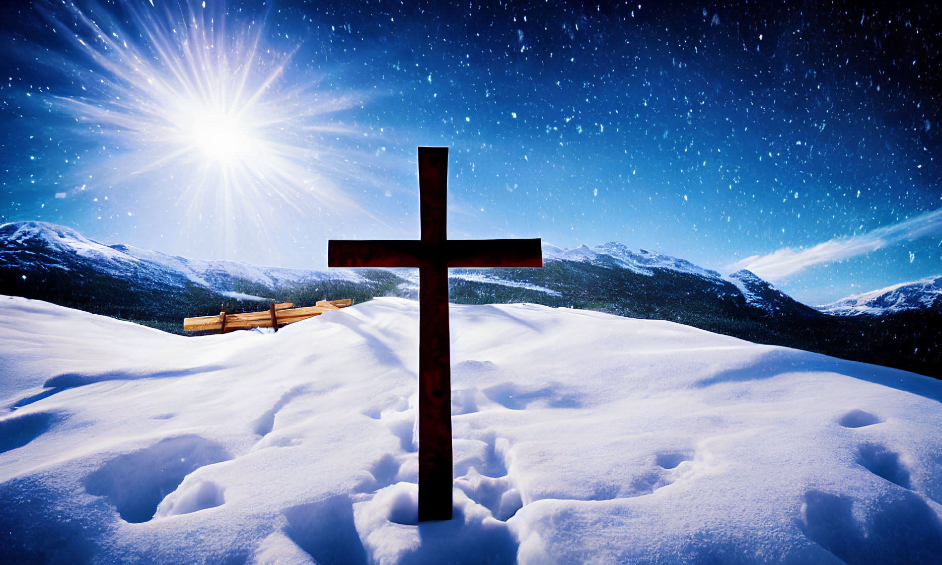 Wooden cross in snowy mountain landscape under starry sky