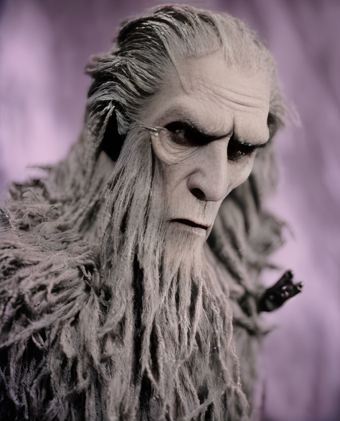 Elaborate costume makeup of aged mystical creature with long gray hair