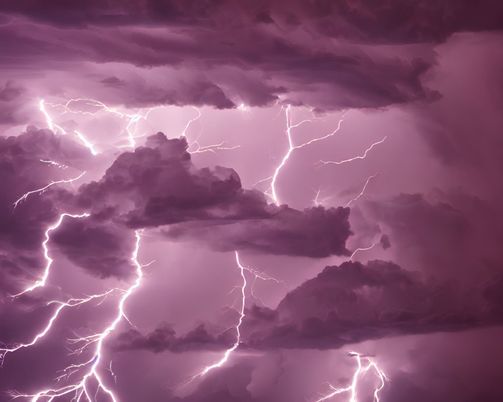 Dramatic purple sky with lightning strikes in dark clouds