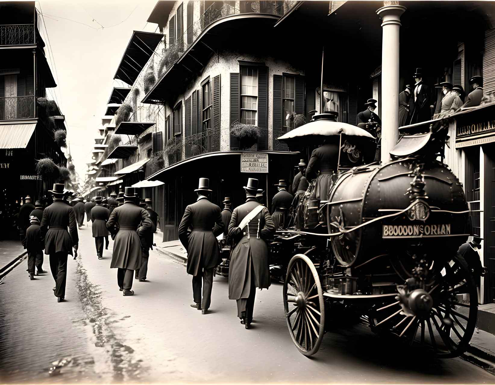 Vintage street scene with men in suits, horse-drawn fire engine, and balconied buildings