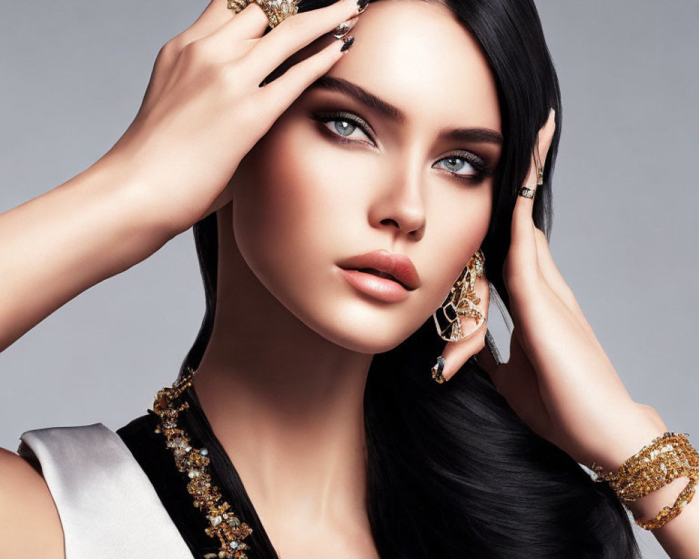 Woman with Blue Eyes and Dark Hair in Gold Jewelry Poses Elegantly