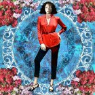 Digital illustration: Woman in red jacket & black pants against vibrant floral background