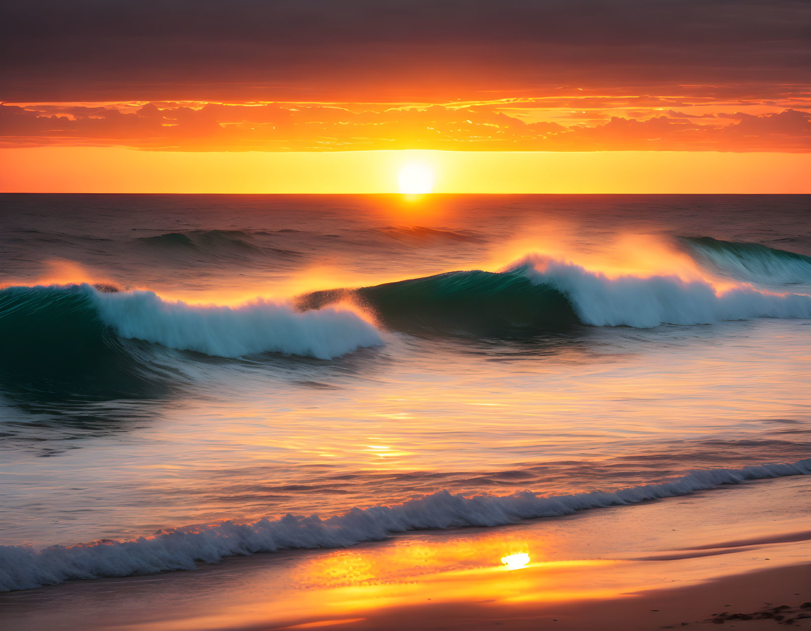 Fiery sunset over ocean with golden waves