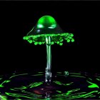 Luminous green mushroom in dark environment with glowing underside.