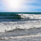 Thunderstorm over rocky shore with turbulent waves