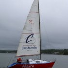 Classic Painting: Crew on Red Sailboat with Floral Pattern Sail