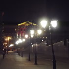 Snowy Winter Dusk Scene with Decorated Lamp Posts