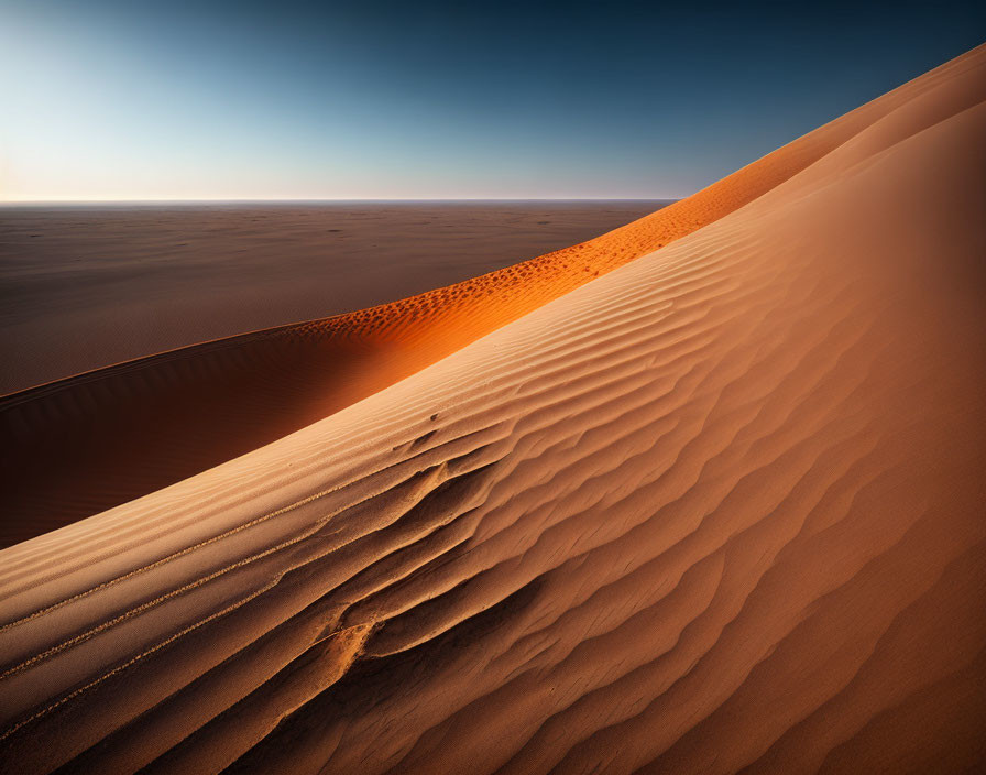 Desert Landscape with Towering Sand Dune and Blue Sky