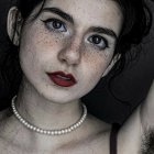 Detailed portrait of woman with silver face filigree, heterochromia, and curly hair