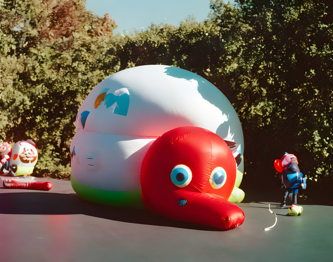 Anthropomorphic Inflatable Sculptures: Red Octopus, Globe, and Characters Outdoors