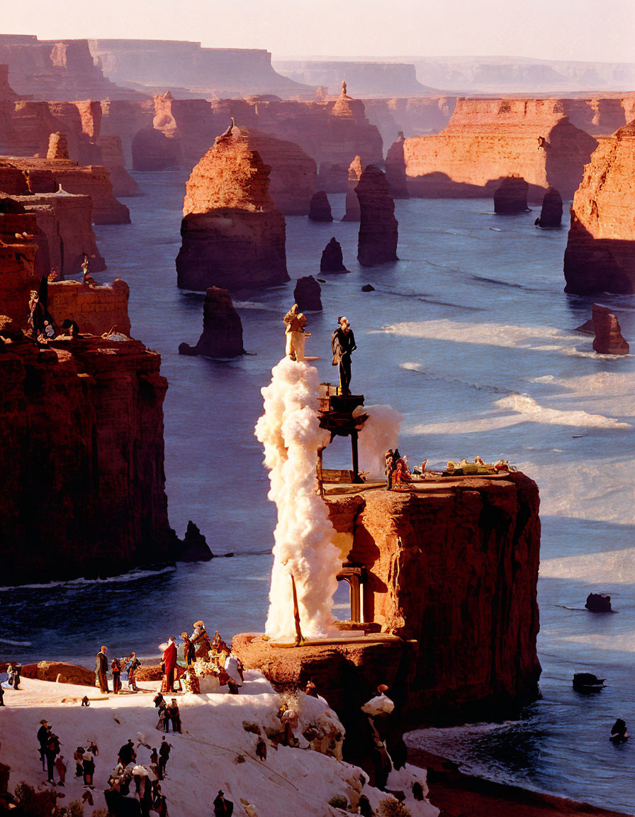 Group of people around tall rock pillar with smoke in desert landscape