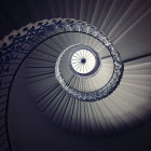 Ornate balustrades spiral staircase view from bottom to top