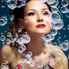 Vibrant makeup woman in pink top surrounded by soap bubbles on blue backdrop