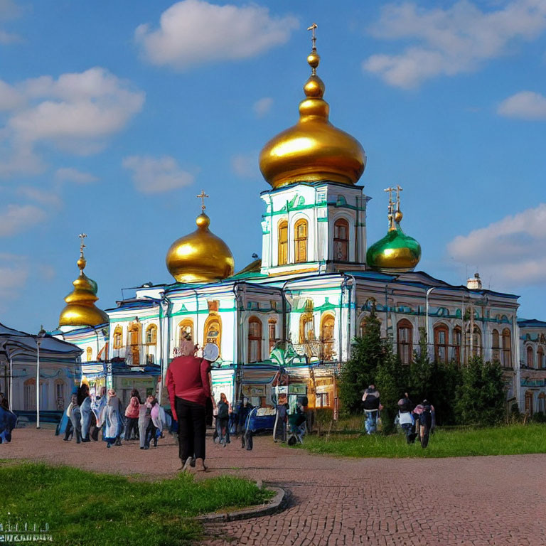 Vibrant orthodox cathedral with golden domes under clear blue sky