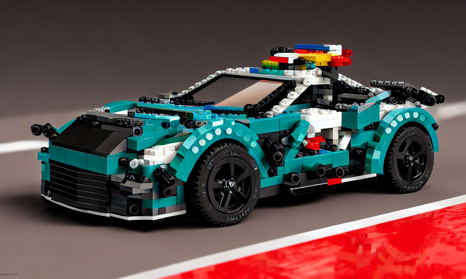 Teal Sports Car LEGO Model with Black Trim on Reflective Surface