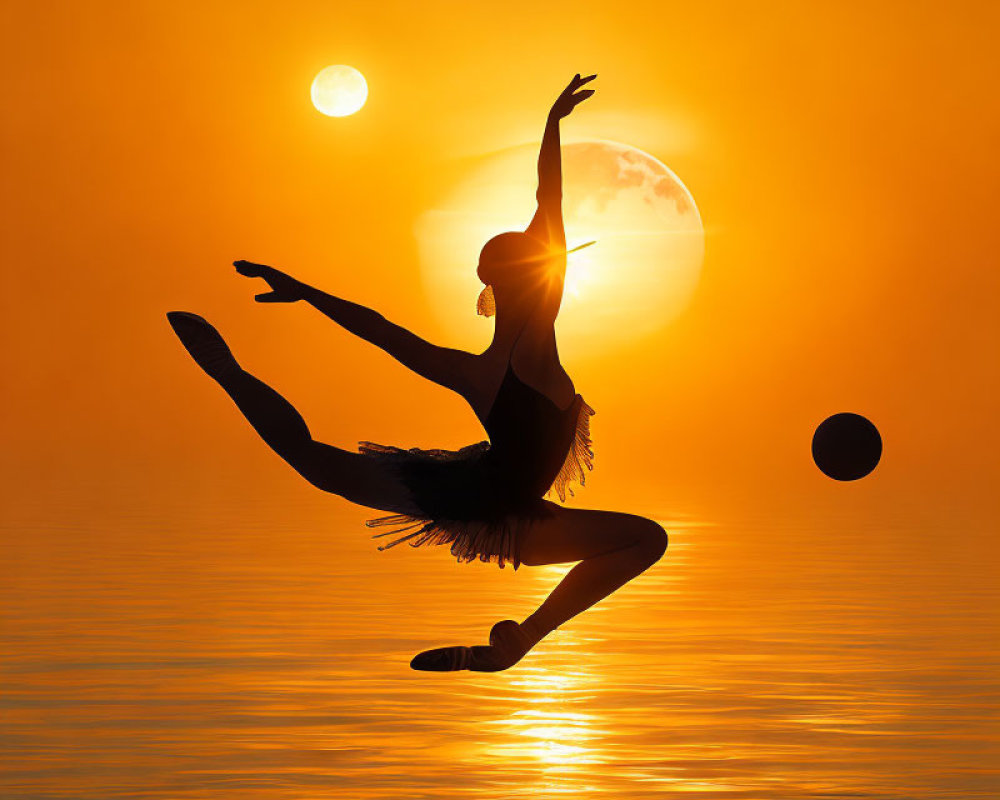 Silhouette of ballet dancer in elegant pose at sunset with celestial orbs