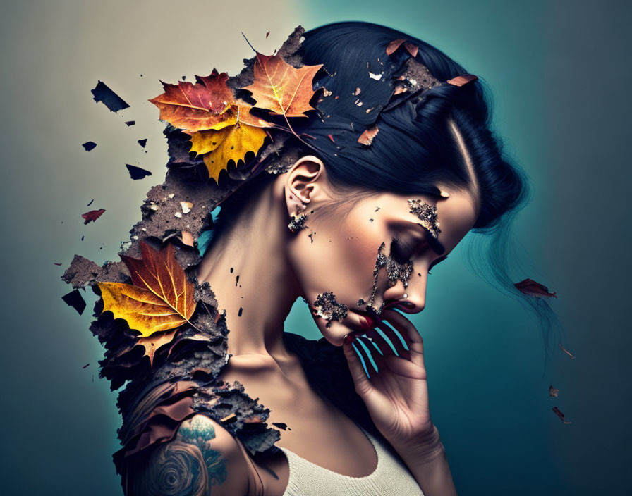 Dark-haired woman surrounded by autumn leaves in surreal portrait.