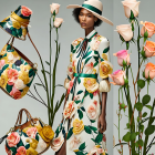 Fashion model wears floral dress and accessories against backdrop with matching flower motifs.