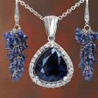 Luxurious Jewelry Set: Black Gem Pendant, Blue & Clear Crystal Earrings