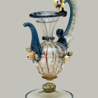 Porcelain ewer with gold accents and floral motifs