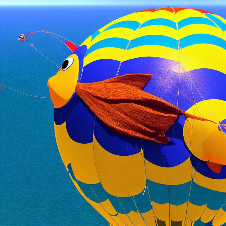 Vibrant fish-shaped hot air balloon over blue sea with parasailing person