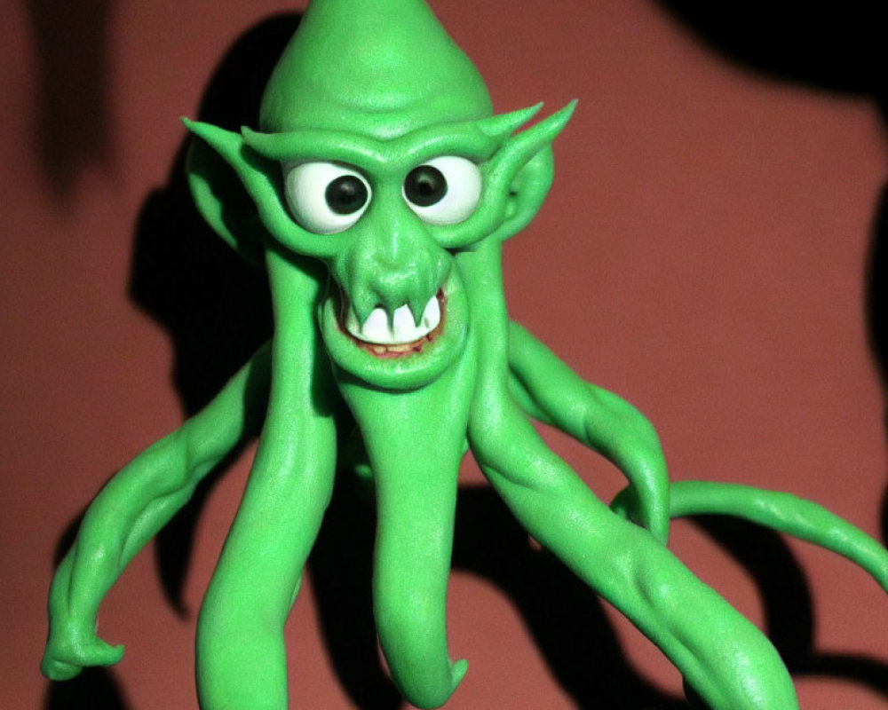 Green Animated Goblin-Like Character with Tentacle-Like Legs