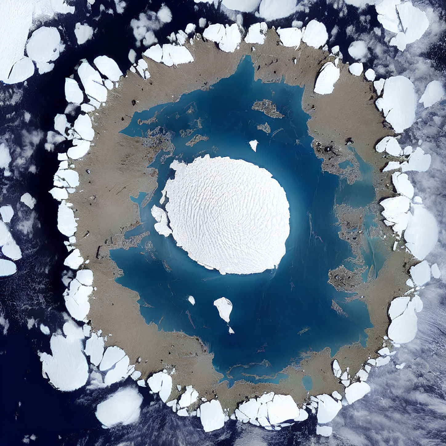 Satellite View of Ice-Covered Body of Water with Central Ice Formation