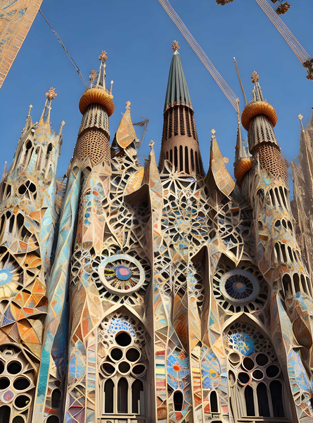 Detailed Gothic architecture and colorful mosaics of Sagrada Família facade