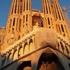 Intricate facade of Sagrada Familia with stained glass window