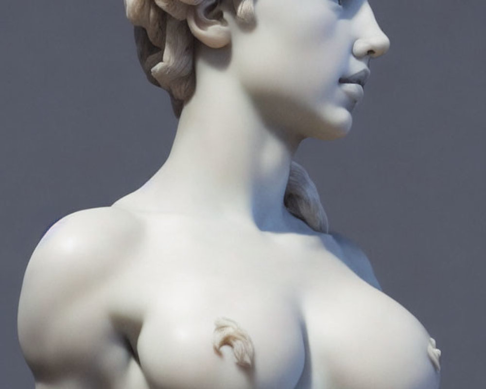 Detailed marble sculpture of figure with curly hair and draped cloth