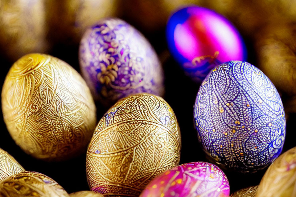 Elaborately Decorated Eggs in Golds and Purples for Festive Occasions