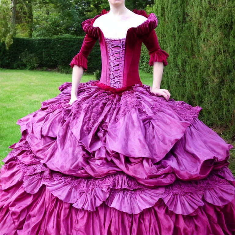 Victorian-style purple dress in lush garden setting