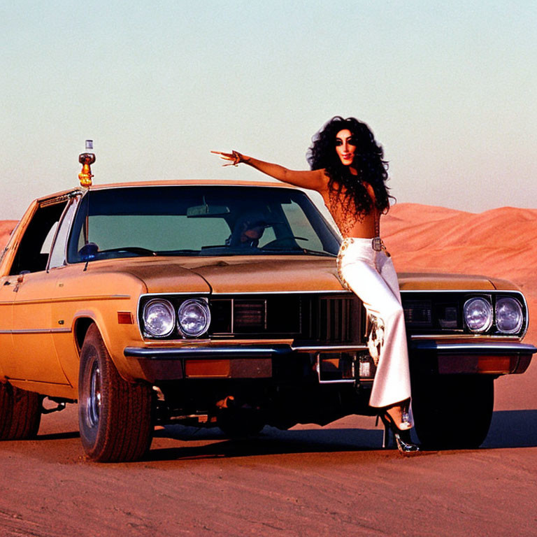 Dark-haired person poses stylishly next to yellow car in desert setting