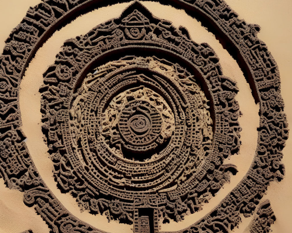 Circular Stone Artifact with Detailed Motifs and Central Pattern on Beige Background