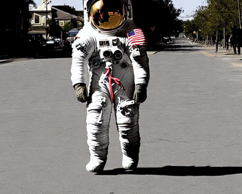 Astronaut in full spacesuit with American flag patch on urban street
