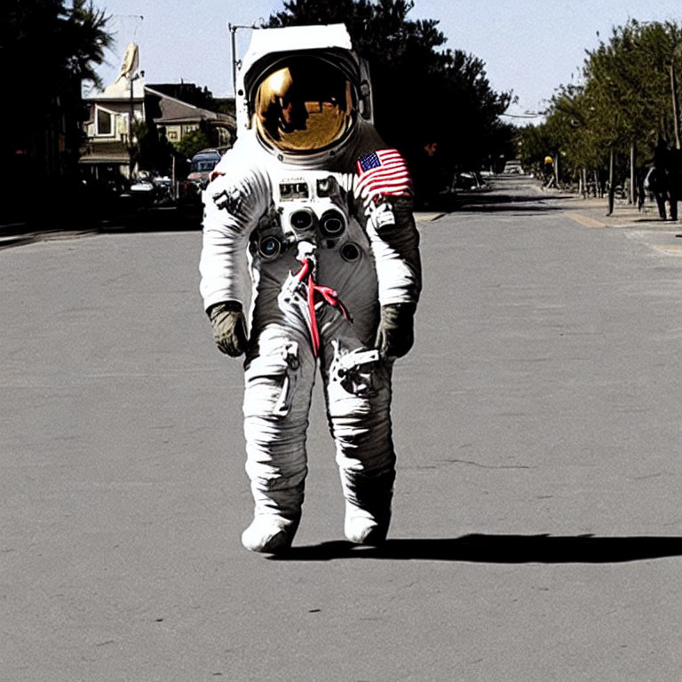 Astronaut in full spacesuit with American flag patch on urban street