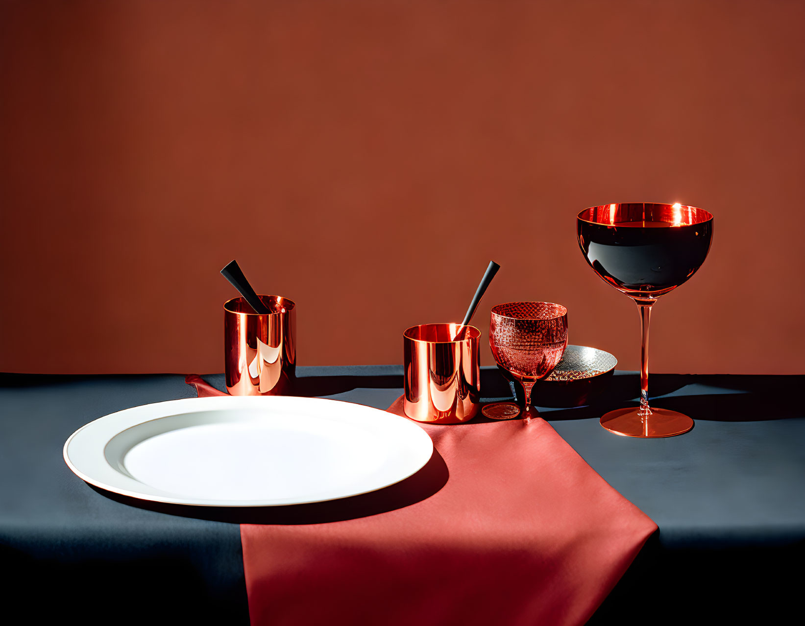Sophisticated table setting with copper dinnerware on navy tablecloth