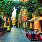 Busy street scene with outdoor cafes, greenery, flowers, colorful buildings.