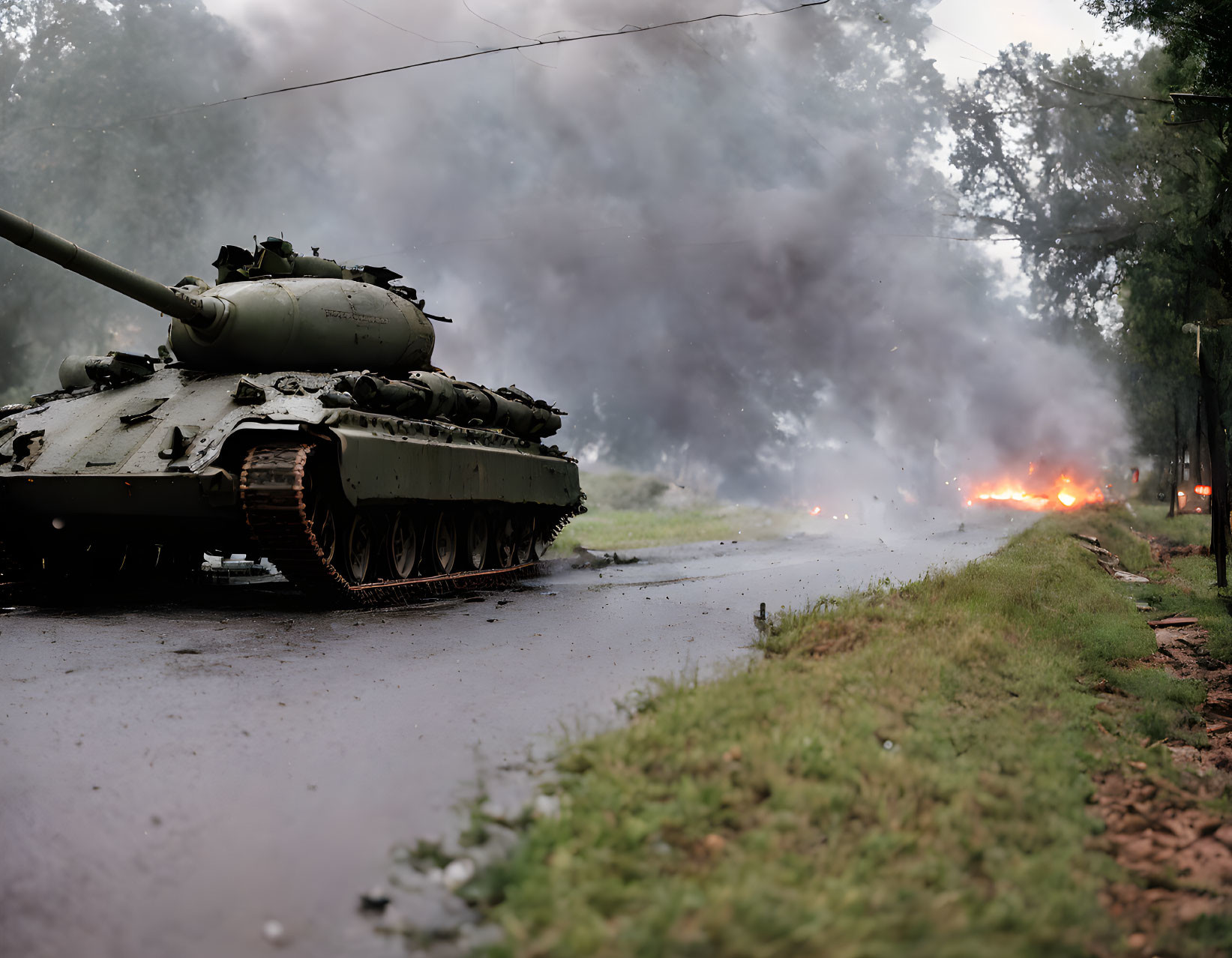 Tank on road with billowing smoke and flames in background.