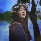 Portrait of Woman with Dark Hair and Flower Crown in Nature Scene