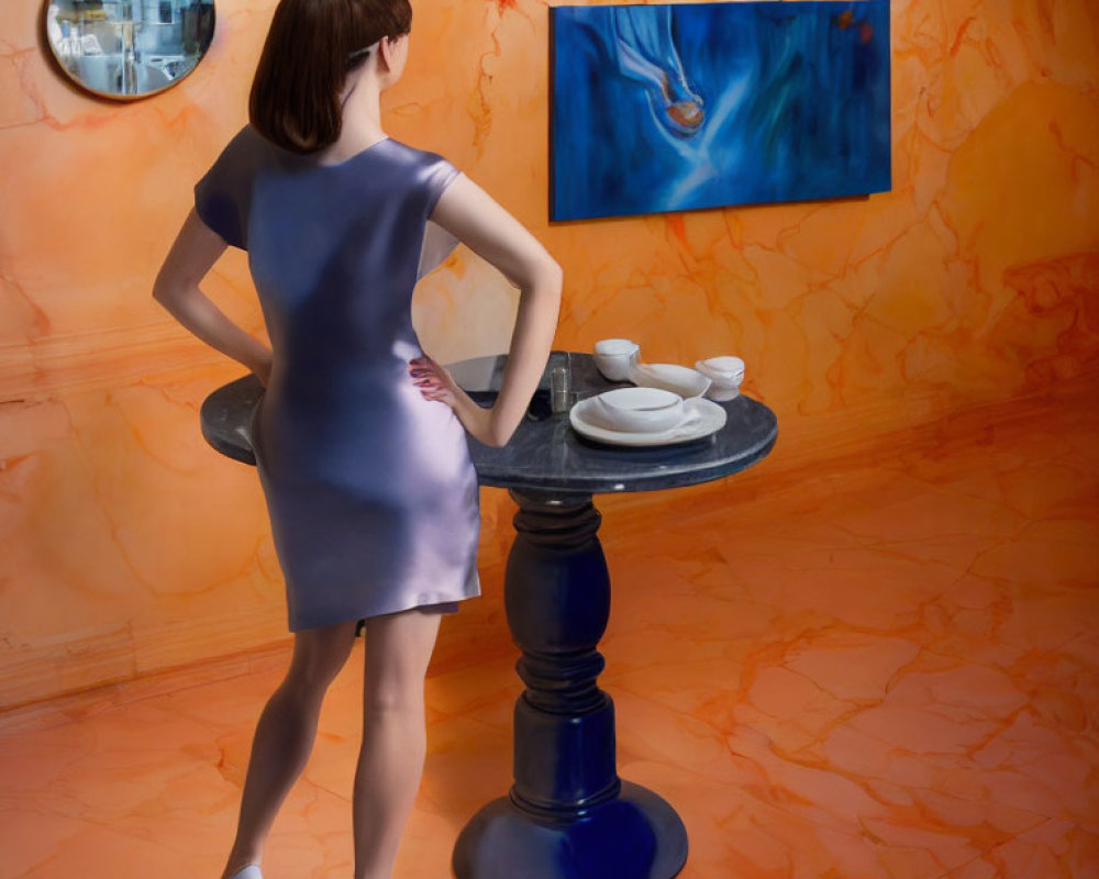 Woman in blue dress and white heels in orange room with round table and artwork.