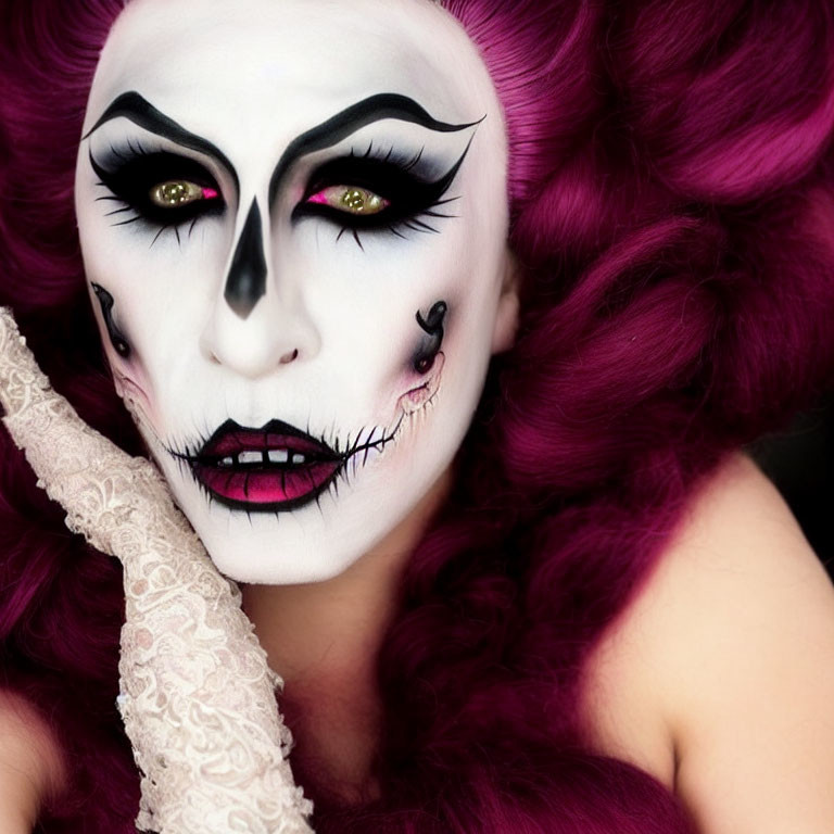 Vibrant purple wig and dramatic skull makeup with intense eyes.