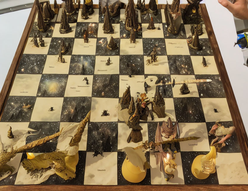 Space-themed chessboard with fantasy figures held by person